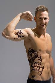 Tribal+dragon+tattoo+arm