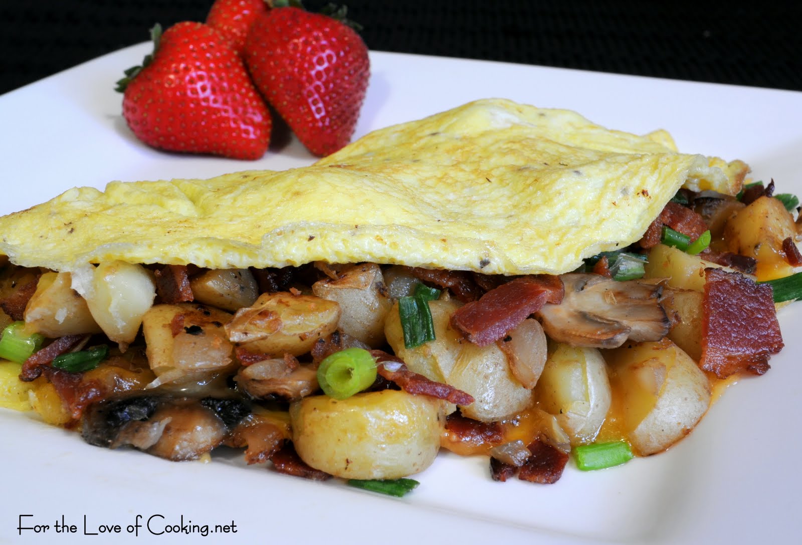 Peasant Omelet with Potatoes, Mushrooms, Bacon, and Cheddar For the