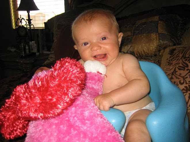 Krew playing with his stuffed animal