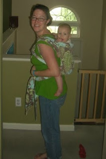 Susannah 8 months in mei tai back carry