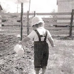 Jennifer watering sweetpeas circa 1970