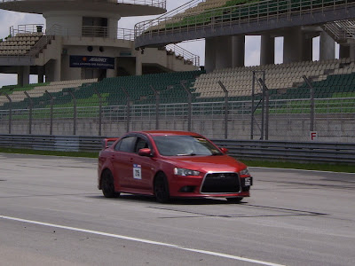Time To Attack Sepang Lancer GT with Evo X spoiler