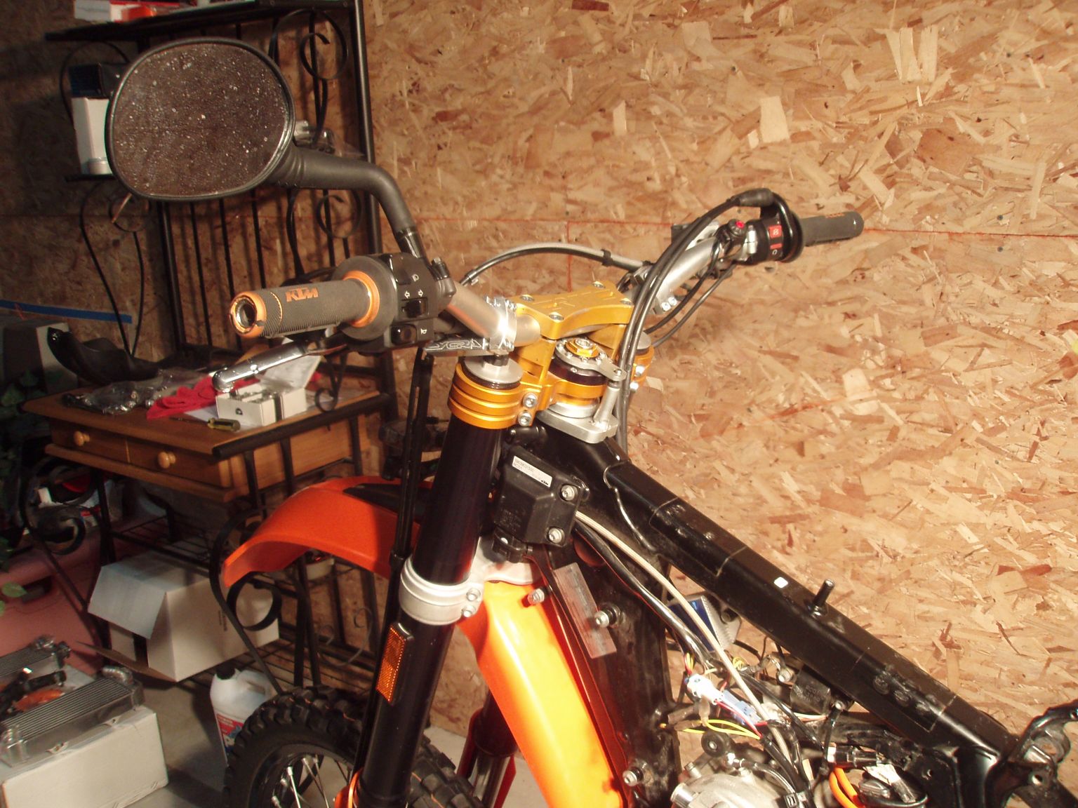 This is the RTT Stabilizer that is integrated with the top triple clamp. I prefer riding with stabilizers and all my bikes have them. I have used Scotts, ...