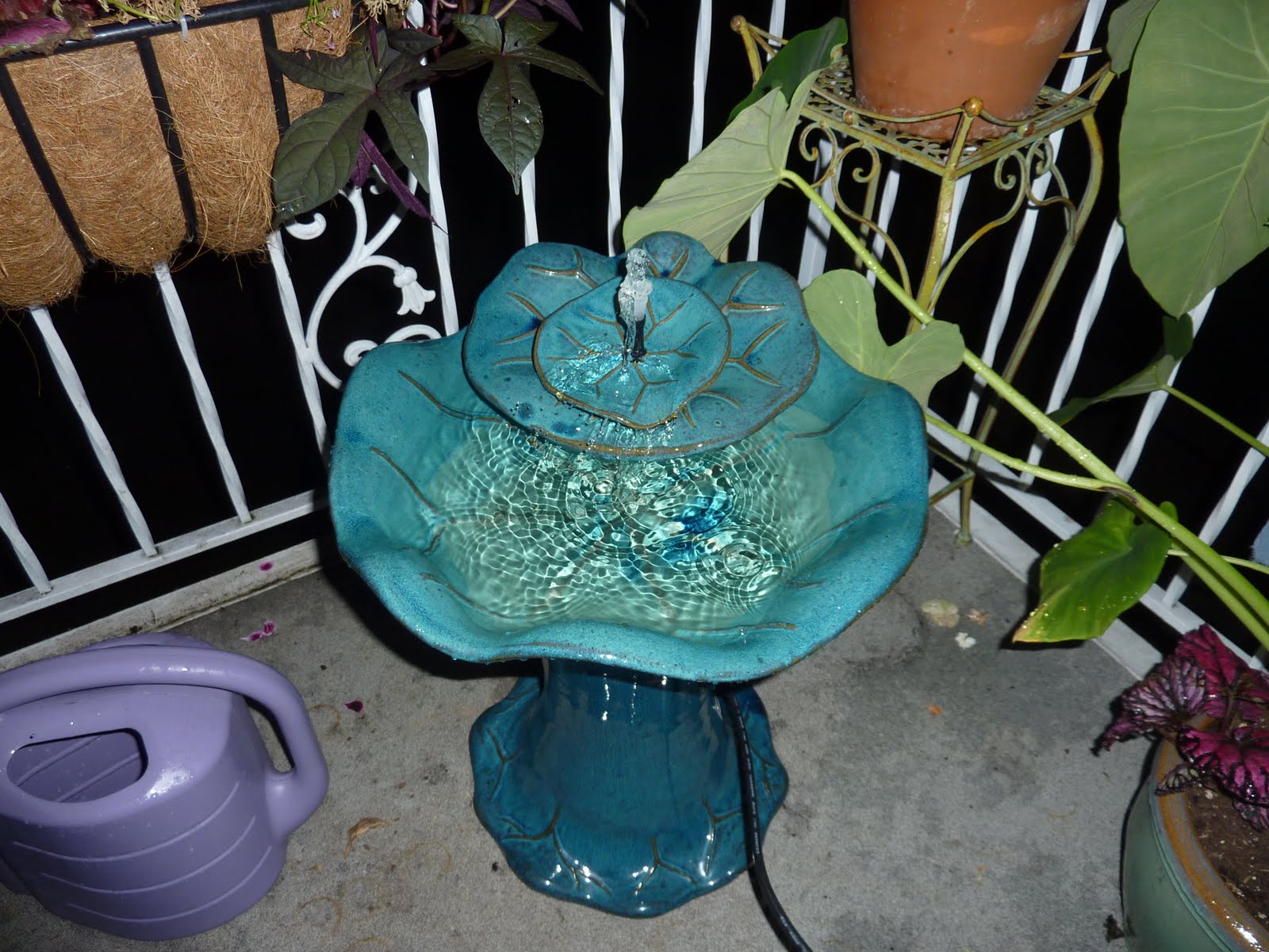 Balcony Oasis Adding a Water Fountain to a Small Garden