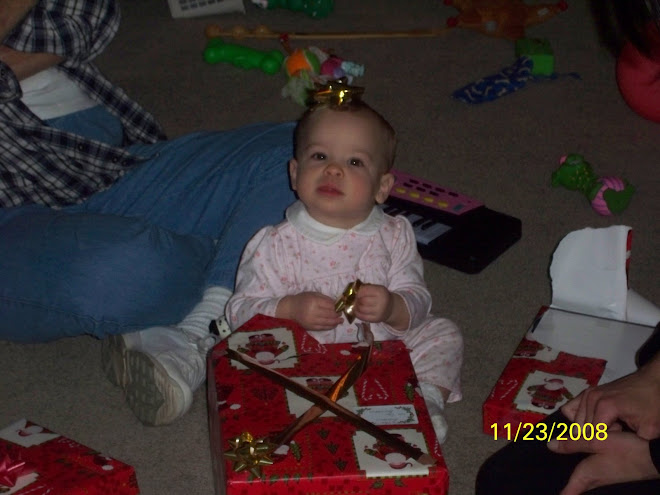 Madelyn having too much fun with bows