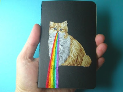 kitten+barfing+up+a+rainbow+notebook.jpg