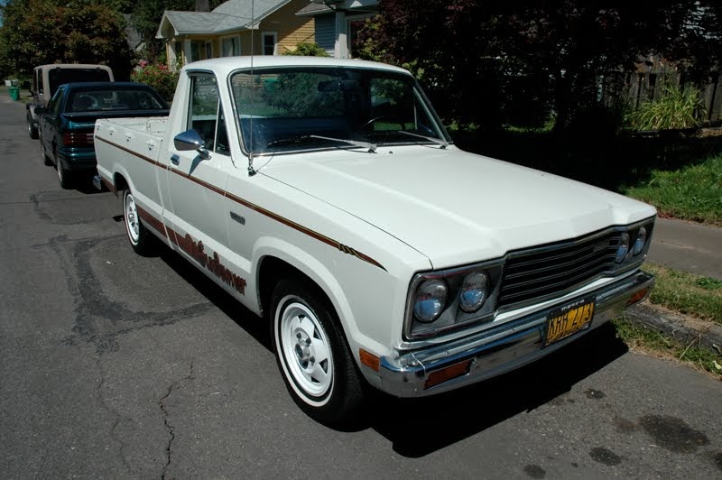 OLD PARKED CARS. 1980 Mazda B2000 Sundowner.