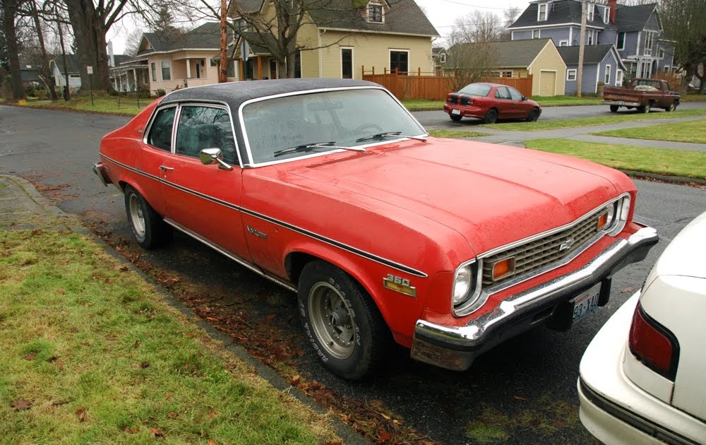 OLD PARKED CARS. 1974 Chevrolet Nova Custom Hatchback.
