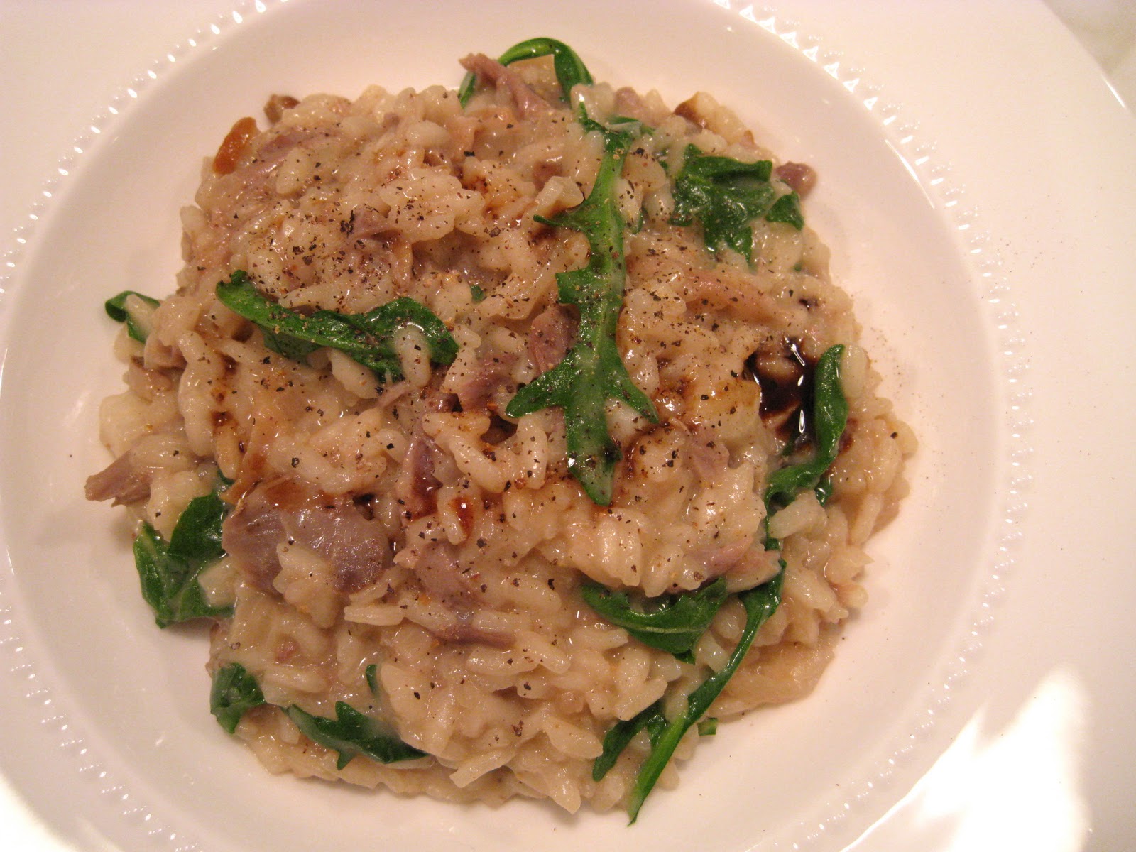 Risotto with Duck Confit, Porcini Mushroom, Red Pear and Arugula