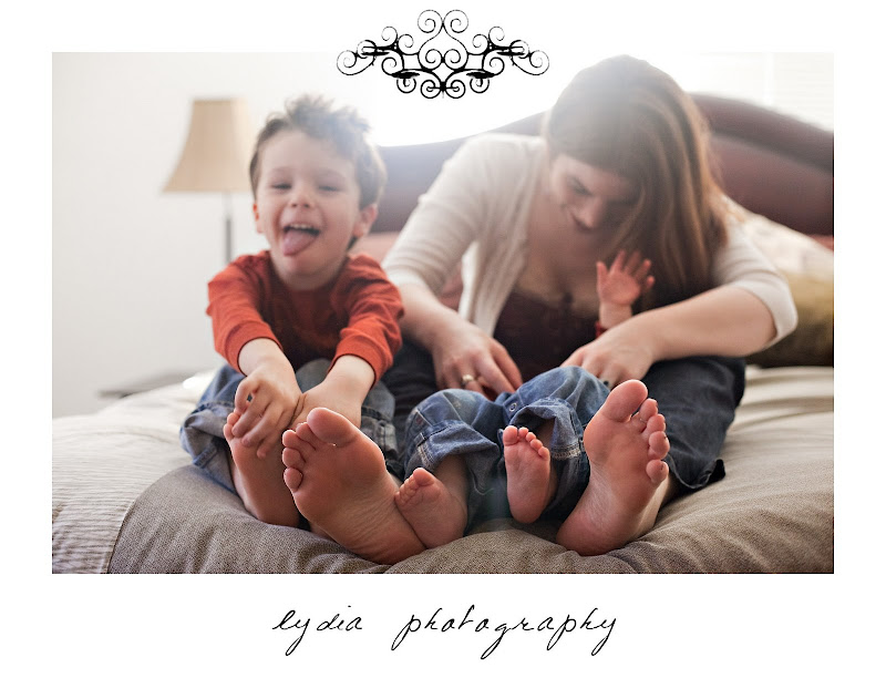 Little boy with baby and their mother at lifestyle kids portraits in Auburn, California