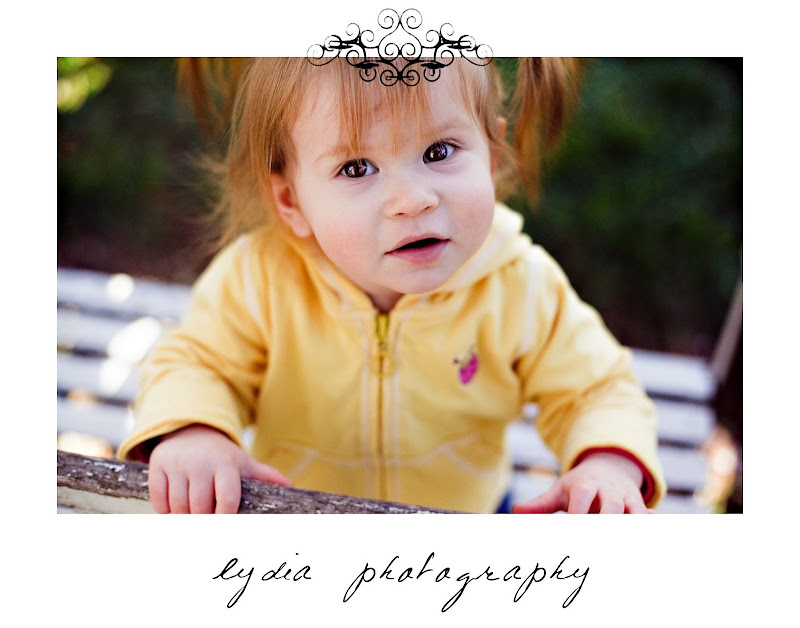 Little girl looking up at lifestyle maternity portraits in Grass Valley, California