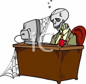 0511-0701-3117-1335_Skeleton_Behind_a_Business_Desk_clipart_image.jpg