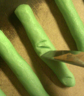 Use tip of knife to make knuckle indentations
