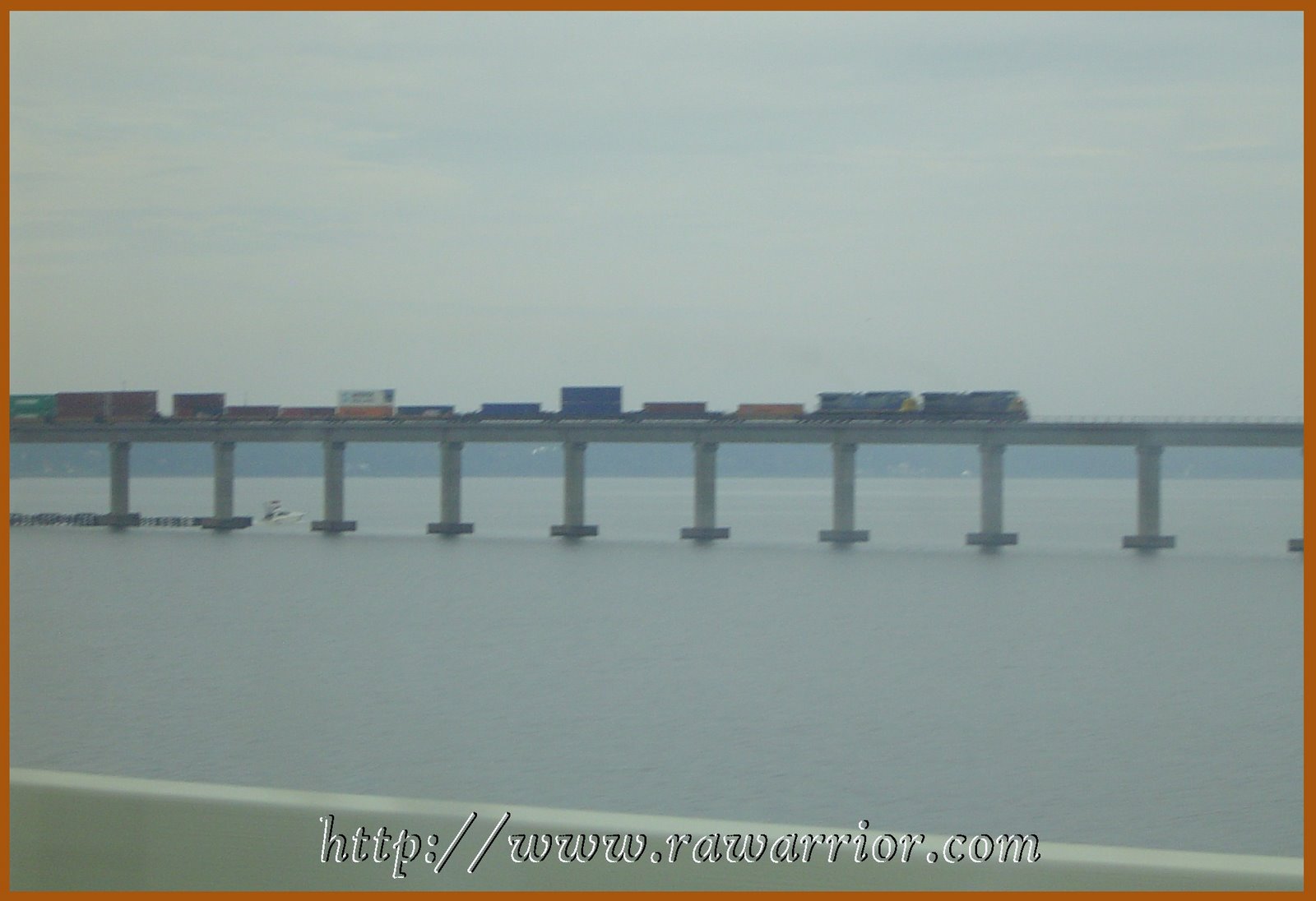 [train+on+bridge+over+bay.jpg]