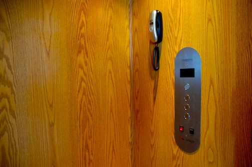 interior elevator equipped with phone and safety features