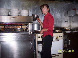 The cook in action at Pelligrini's Italian cafe,