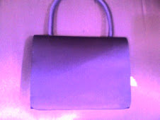 Bolso de raso morado pvp 8€