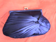 Bolso plisado de Tiffany azul electrico pvp 25€