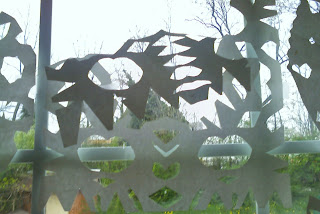 paper snowflakes over window