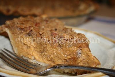 A classic pumpkin pie from Libby's, made here with a praline topping and served with a maple rum sauce.