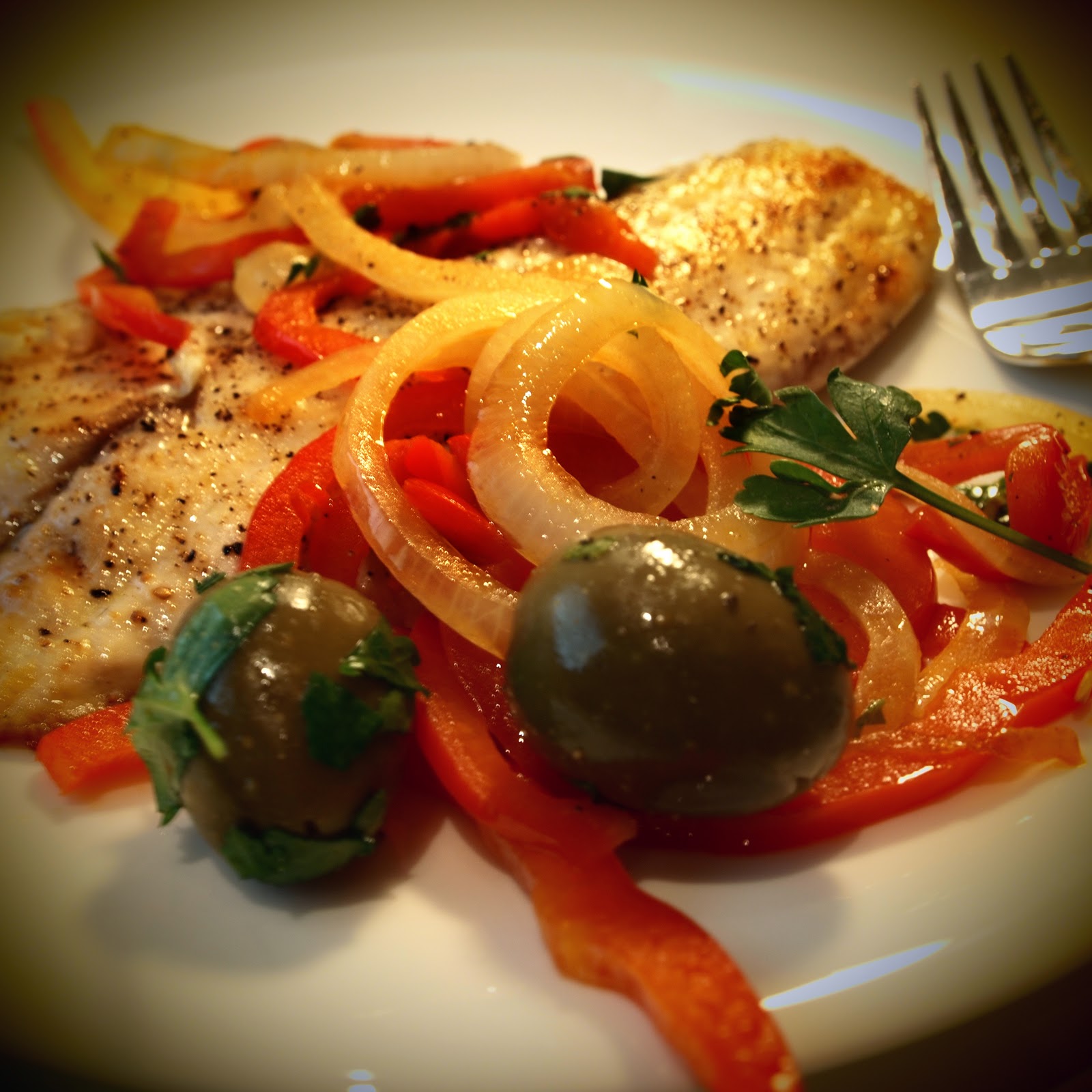 The 10 cent Diet Tilapia served with peppers, onions and olives
