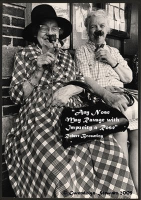 Photograph of TWO LADIES & THEIR ROSES IN HARVARD SQUARE by GWENDOLYN STEWART, c. 2009; All Rights Reserved