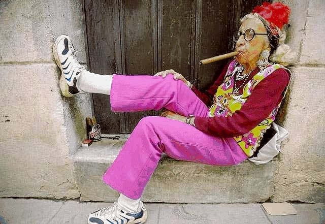 Old-lady-on-doorstep-with-cigar.jpg