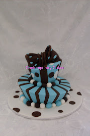 Mad Hatters cake in teal blue and chocolate.