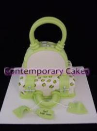 2 tier lime green and ivory travelling suitcase cake.