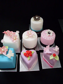 Assorted shaped miniature cakes.