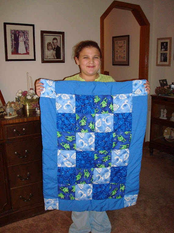 Courtney and her first quilt