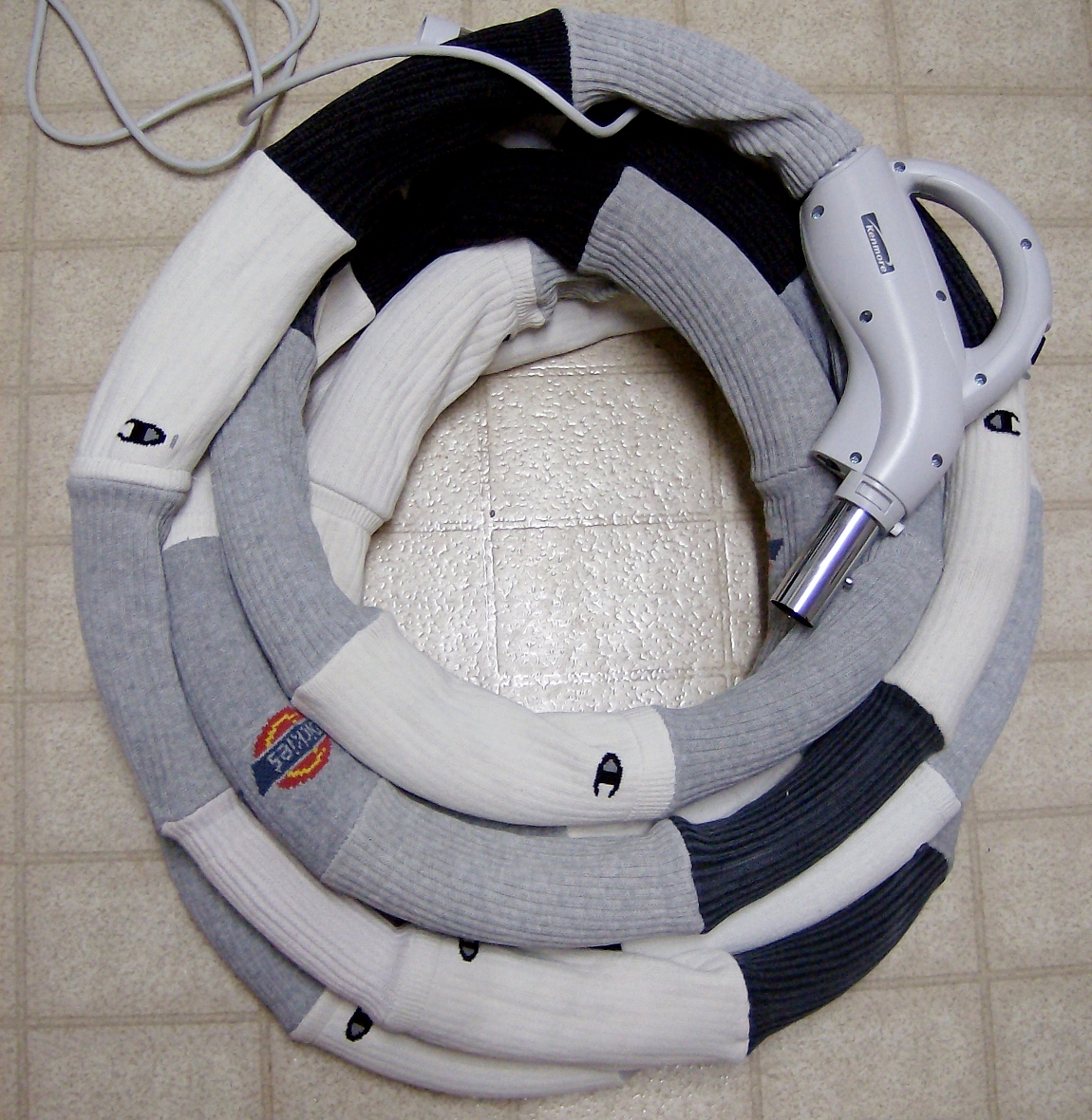 Overflow Creativity Old Socks = Central Vac Hose Cover