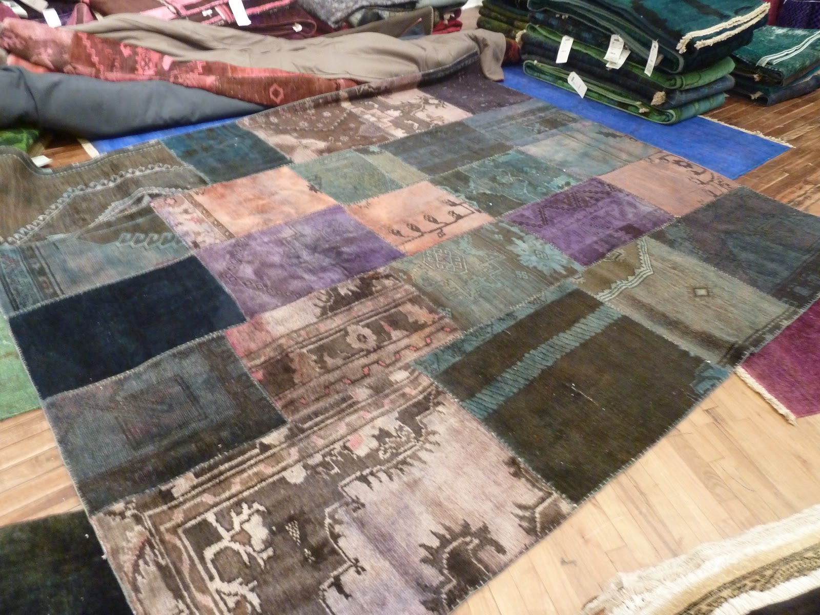 A stunning rug, dyed, pieced and sewn from old, no longer viable