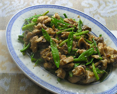 Stir-Fried Fish with Snow Peas, Mushrooms and Garlic Scapes