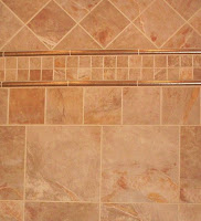 tile tub surround uses four tile sizes for effect