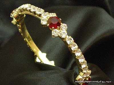اكسسوارات ذهبيه رائعه Gold+bracelet+with+white+crystals+and+rubies