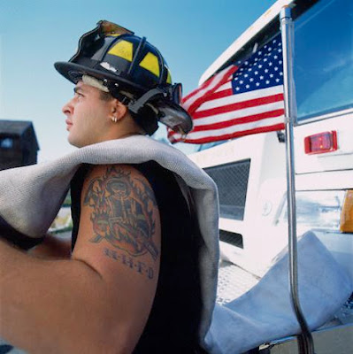 Firefighter Helmet w/ flames flame tattoos. Phoenix legend known around the