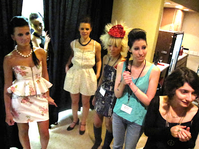 models and designers backstage at the Art is Fashion show March 25 in Santa