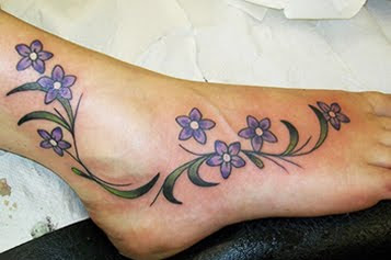 vine tattoo on foot