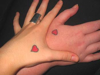 Simple Love Tattoo on hand