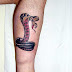 Snake designs on foot - Dragon tattoo