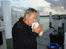 Paul blowing the conch horn