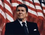 [Ronald+Reagan+in+front+of+flags.jpg]