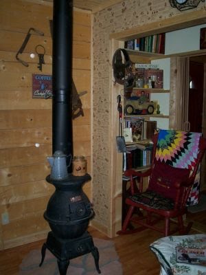 potbelly stove in den/bedroom