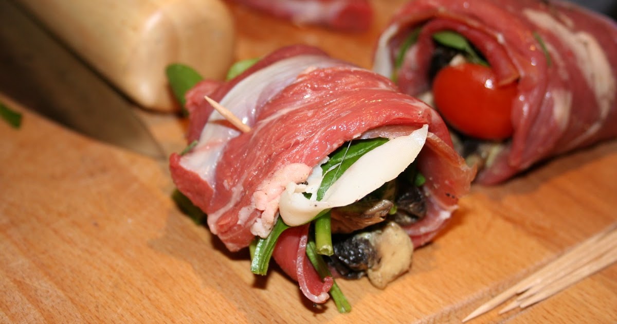 Lamb Fillet Tornedos with Prosciutto, Spinach, Mushroom and Tomato