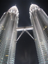 staring at the beauty of The Petronas in KL, Malaysia