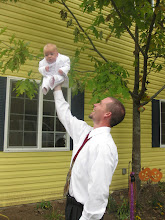 Dad showing off his boy