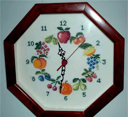 reloj con frutas