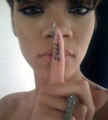 Here's an example picture of Rihanna's tattoo. star tattoo in her ear