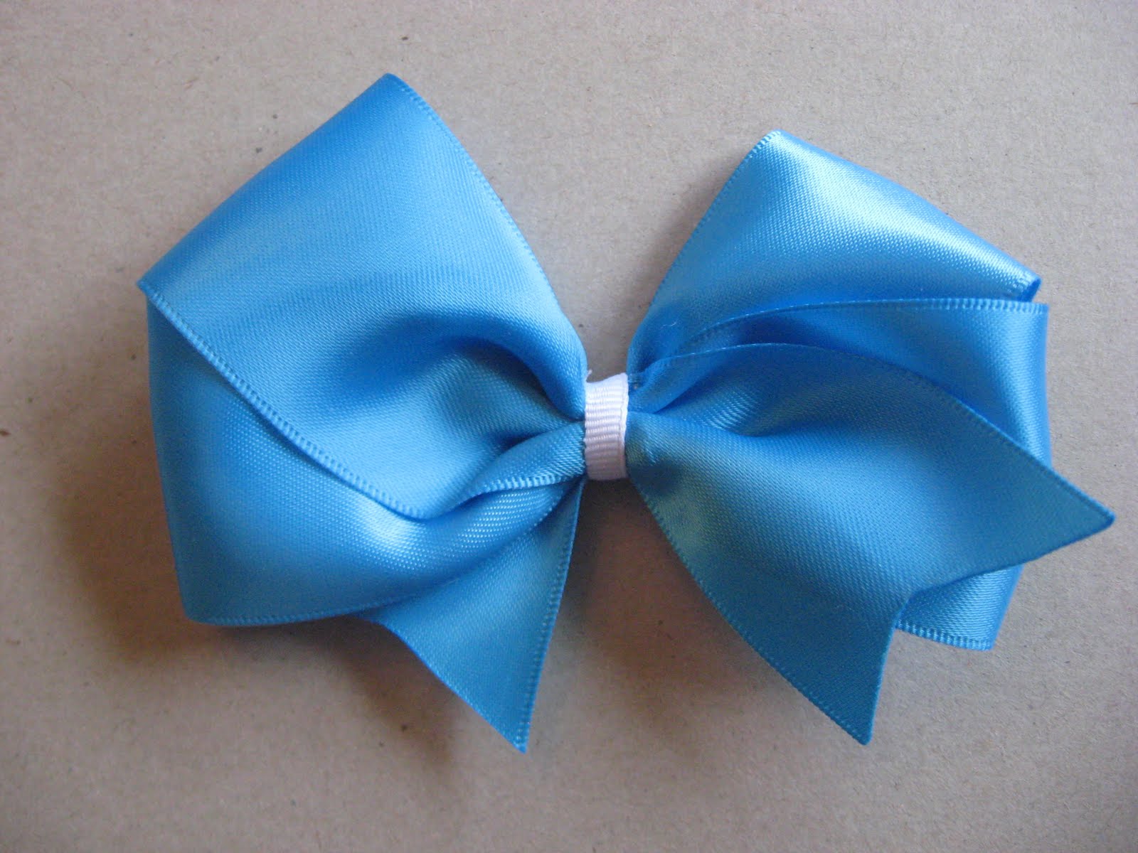 Pretty Ditty Hair Bows: Orange or Blue - These bows are perfect for you!